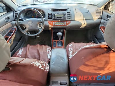 Zdjęcie 8 z 12 samochodu: 2003 TOYOTA CAMRY LE VIN:4T1BE30K73U672322 - miniatura