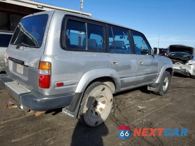 Trzecie zdjęcie samochodu z tyłu: 1991 TOYOTA LAND CRUISER FJ80 VIN:JT3FJ80W8M0012496 - miniatura