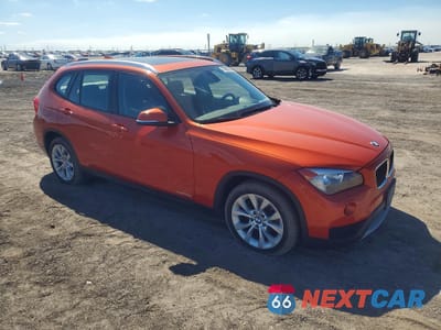 Czwarte zdjęcie samochodu z boku: 2014 BMW X1 XDRIVE28I VIN:WBAVL1C51EVY21724 - miniatura