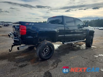 Trzecie zdjęcie samochodu z tyłu: 2018 CHEVROLET SILVERADO K2500 HEAVY DUTY LT VIN:1GC1KVEY0JF242876 - miniatura
