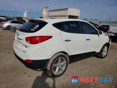 Trzecie zdjęcie samochodu z tyłu: 2013 HYUNDAI TUCSON VIN:KM8JUCAC4DU663570 - miniatura