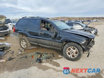 Czwarte zdjęcie samochodu z boku: 2001 JEEP GRAND CHEROKEE LAREDO VIN:1J4GW48S61C694679 - miniatura