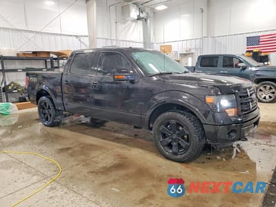 Czwarte zdjęcie samochodu z boku: 2014 FORD F150 SUPERCREW VIN:1FTFW1ET3EFC98985 - miniatura