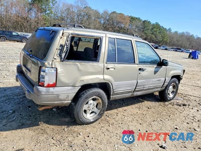 Trzecie zdjęcie samochodu z tyłu: 1998 JEEP GRAND CHEROKEE LAREDO VIN:1J4FX58S3WC281298 - miniatura