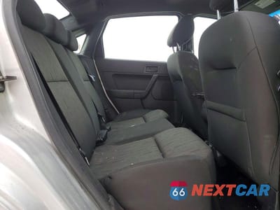 Zdjęcie 10 z 11 samochodu: 2010 FORD FOCUS SE VIN:1FAHP3FN4AW112002 - miniatura