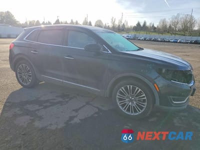 Czwarte zdjęcie samochodu z boku: 2016 LINCOLN MKX RESERVE VIN:2LMTJ8LR1GBL24215 - miniatura
