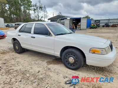 Czwarte zdjęcie samochodu z boku: 2003 FORD CROWN VICTORIA POLICE INTERCEPTOR VIN:2FAFP71WX3X174574 - miniatura