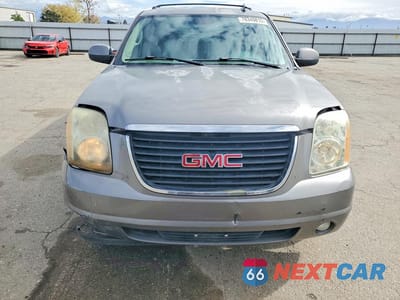 Piąte zdjęcie samochodu w środku: 2007 GMC YUKON XL C1500 VIN:1GKFC16057J232486 - miniatura