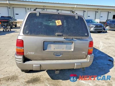 Zdjęcie 6 z 12 samochodu: 1998 JEEP GRAND CHEROKEE LIMITED VIN:1J4GZ78YXWC355279 - miniatura