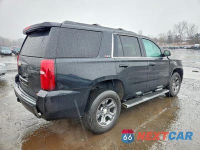 Trzecie zdjęcie samochodu z tyłu: 2016 CHEVROLET TAHOE K1500 LT VIN:1GNSKBKC3GR165575 - miniatura