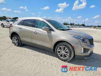 Czwarte zdjęcie samochodu z boku: 2022 CADILLAC XT5 PREMIUM LUXURY VIN:1GYKNDRS2NZ180830 - miniatura