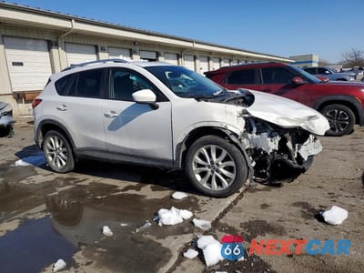 Czwarte zdjęcie samochodu z boku: 2014 MAZDA CX-5 GT VIN:JM3KE4DY4E0313438 - miniatura