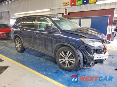 Czwarte zdjęcie samochodu z boku: 2016 HONDA PILOT EXL VIN:5FNYF6H57GB038891 - miniatura