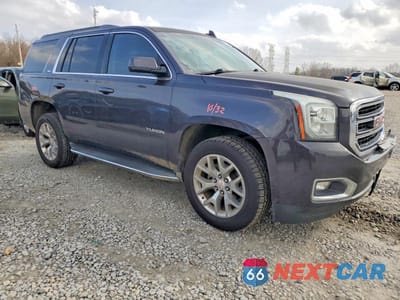 Czwarte zdjęcie samochodu z boku: 2016 GMC YUKON SLT VIN:1GKS1BKC6GR257649 - miniatura