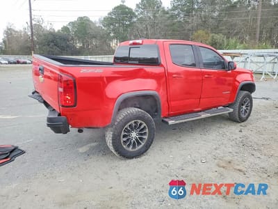 Trzecie zdjęcie samochodu z tyłu: 2018 CHEVROLET COLORADO VIN:1GCGTEEN4J1282663 - miniatura