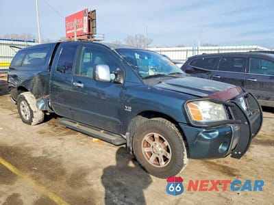 Czwarte zdjęcie samochodu z boku: 2004 NISSAN TITAN XE VIN:1N6AA06B94N541497 - miniatura