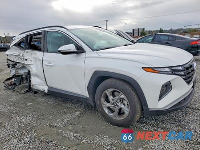 Czwarte zdjęcie samochodu z boku: 2023 HYUNDAI TUCSON SEL VIN:5NMJBCAE8PH288600 - miniatura