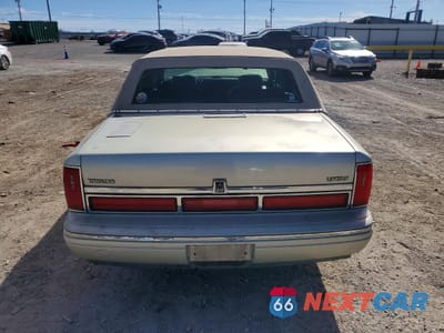 Zdjęcie 6 z 13 samochodu: 1997 LINCOLN TOWN CAR EXECUTIVE VIN:1LNLM81W1VY681650 - miniatura