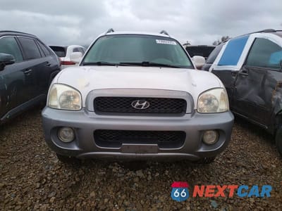 Piąte zdjęcie samochodu w środku: 2003 HYUNDAI SANTA FE GLS VIN:KM8SC13D03U478013 - miniatura