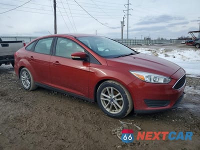 Czwarte zdjęcie samochodu z boku: 2018 FORD FOCUS SE VIN:1FADP3F2XJL310430 - miniatura
