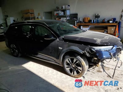 Czwarte zdjęcie samochodu z boku: 2018 BUICK REGAL TOURX ESSENCE VIN:W04GV8SX4J1088551 - miniatura