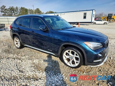 Czwarte zdjęcie samochodu z boku: 2015 BMW X1 SDRIVE28I VIN:WBAVM1C53FV498436 - miniatura