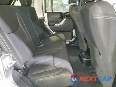 Zdjęcie 11 z 12 samochodu: 2013 JEEP WRANGLER UNLIMITED SAHARA VIN:1C4BJWEG0DL560796 - miniatura