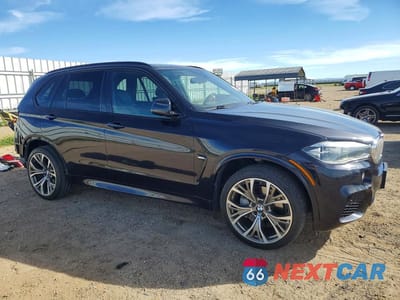 Czwarte zdjęcie samochodu z boku: 2014 BMW X5 XDRIVE50I VIN:5UXKR6C53E0C03658 - miniatura