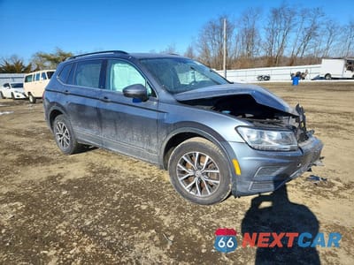 Czwarte zdjęcie samochodu z boku: 2019 VOLKSWAGEN TIGUAN SE VIN:3VV2B7AX7KM148140 - miniatura
