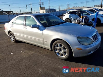 Czwarte zdjęcie samochodu z boku: 2000 MERCEDES-BENZ SL-CLASS VIN:WDBNG70J9YA084102 - miniatura