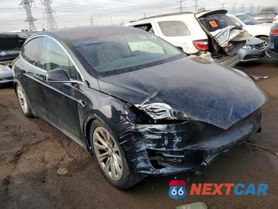 Czwarte zdjęcie samochodu z boku: 2017 TESLA MODEL X VIN:5YJXCDE2XHF054314 - miniatura