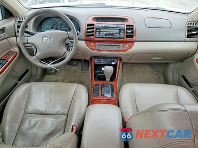 Zdjęcie 8 z 11 samochodu: 2003 TOYOTA CAMRY LE VIN:4T1BE30K03U739195 - miniatura