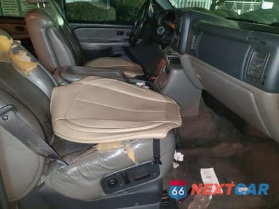 Zdjęcie 13 z 14 samochodu: 2002 CHEVROLET SUBURBAN C VIN:1GNEC16T02J238066 - miniatura