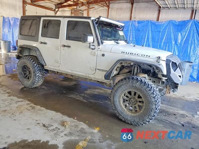Czwarte zdjęcie samochodu z boku: 2015 JEEP WRANGLER UNLIMITED RUBICON VIN:1C4BJWFG2FL504022 - miniatura