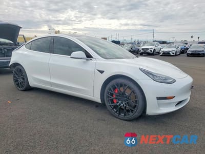 Czwarte zdjęcie samochodu z boku: 2019 TESLA MODEL 3 VIN:5YJ3E1EB8KF393748 - miniatura