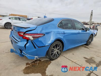 Trzecie zdjęcie samochodu z tyłu: 2024 TOYOTA CAMRY HYBRID SE VIN:4T1G31AK2RU062769 - miniatura