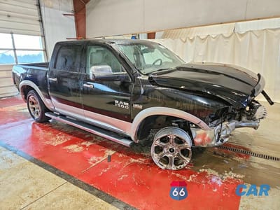 Czwarte zdjęcie samochodu z boku: 2013 RAM 1500 LARAMIE VIN:1C6RR7NT7DS504068 - miniatura