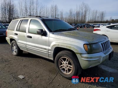 Czwarte zdjęcie samochodu z boku: 2004 JEEP GRAND CHEROKEE LAREDO VIN:1J4GW48S04C343903 - miniatura