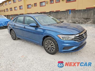 Czwarte zdjęcie samochodu z boku: 2021 VOLKSWAGEN JETTA S VIN:3VWC57BUXMM102087 - miniatura