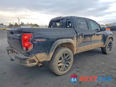 Trzecie zdjęcie samochodu z tyłu: 2025 CHEVROLET COLORADO TRAIL BOSS VIN:1GCPTEEK1S1134526 - miniatura