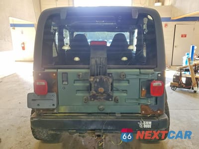 Zdjęcie 6 z 12 samochodu: 2000 JEEP WRANGLER / TJ SPORT VIN:1J4FA49S2YP710100 - miniatura