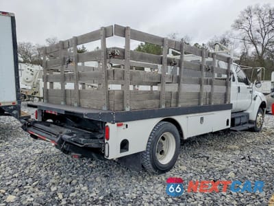 Trzecie zdjęcie samochodu z tyłu: 2006 FORD F650 SUPER DUTY FLATBED TRUCK VIN:3FRWX66H36V269019 - miniatura