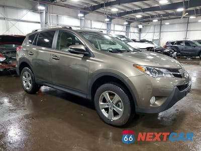 Czwarte zdjęcie samochodu z boku: 2015 TOYOTA RAV4 XLE VIN:JTMRFREV8FD139423 - miniatura