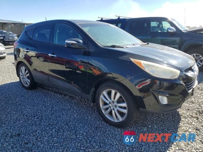 Czwarte zdjęcie samochodu z boku: 2010 HYUNDAI TUCSON LIMITED VIN:KM8JUCAC5AU085362 - miniatura
