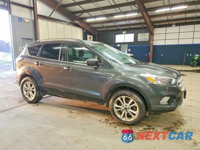 Czwarte zdjęcie samochodu z boku: 2018 FORD ESCAPE SE VIN:1FMCU9GD7JUB34251 - miniatura