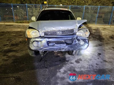 Piąte zdjęcie samochodu w środku: 2004 HYUNDAI SANTA FE GLS VIN:KM8SC13E44U678838 - miniatura