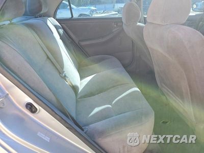 Zdjęcie 10 z 12 samochodu: 2003 TOYOTA COROLLA CE VIN:1NXBR32E53Z128364 - miniatura