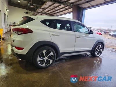 Trzecie zdjęcie samochodu z tyłu: 2017 HYUNDAI TUCSON LIMITED VIN:KM8J3CA22HU464825 - miniatura