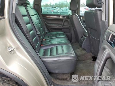 Zdjęcie 10 z 12 samochodu: 2004 VOLKSWAGEN TOUAREG TDI 5.0 VIN:WVGHH77L84D082350 - miniatura