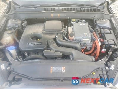 Zdjęcie 11 z 12 samochodu: 2014 FORD FUSION TITANIUM HEV VIN:3FA6P0RU5ER379103 - miniatura